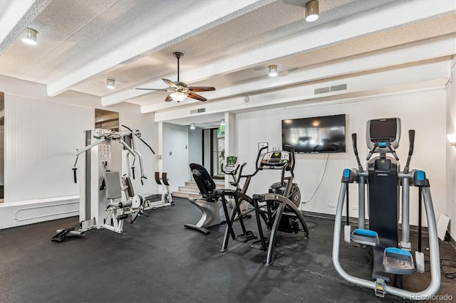 exercise room featuring ceiling fan