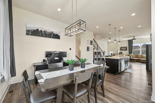 dining area with recessed lighting, visible vents, baseboards, and wood finished floors