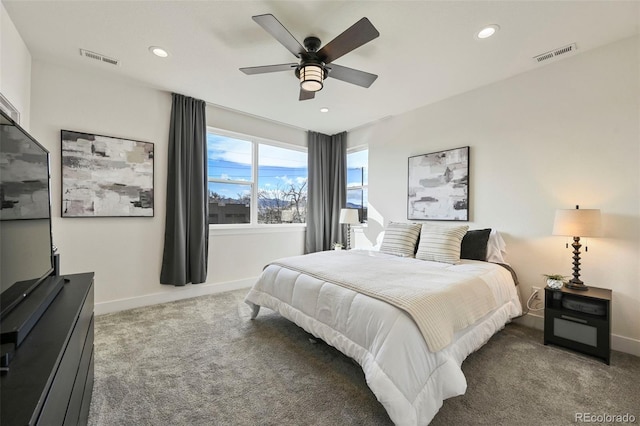 bedroom featuring carpet floors, recessed lighting, visible vents, and baseboards