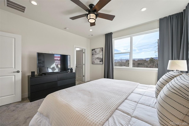 bedroom with light carpet, baseboards, visible vents, a ceiling fan, and recessed lighting