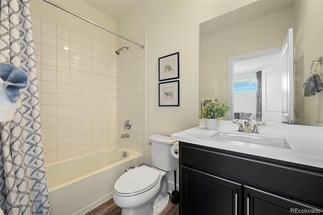 full bathroom featuring toilet, wood finished floors, shower / bath combination with curtain, and vanity