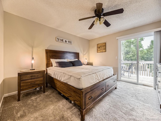 2104 Vineyard Dr, Castle Rock, CO 80104 - bedroom featuring carpet, access to outside, a textured ceiling, and ceiling fan