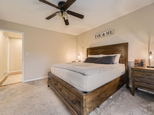 2104 Vineyard Dr, Castle Rock, CO 80104 - bedroom featuring light colored carpet, a textured ceiling, and ceiling fan