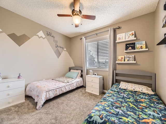 2104 Vineyard Dr, Castle Rock, CO 80104 - carpeted bedroom with a textured ceiling and a ceiling fan