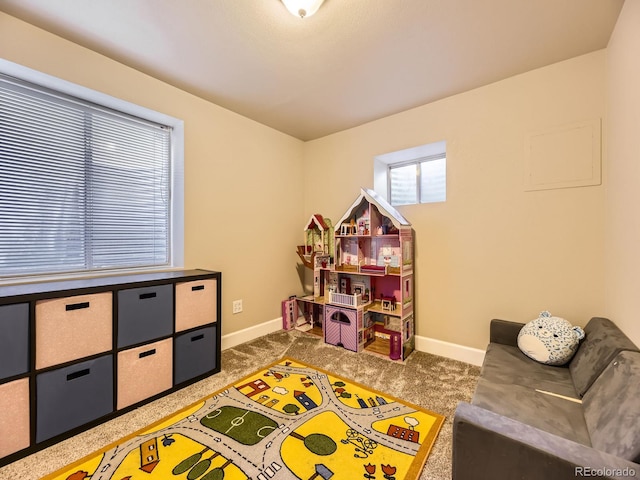 2104 Vineyard Dr, Castle Rock, CO 80104 - rec room with carpet floors and baseboards