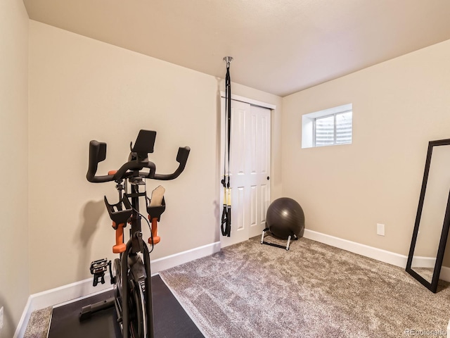2104 Vineyard Dr, Castle Rock, CO 80104 - exercise room featuring baseboards and carpet flooring
