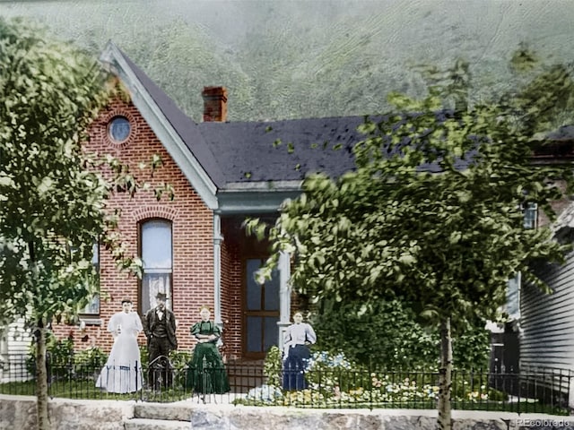 808 Rose St, Georgetown, CO 80444 - view of front of property with brick siding and a chimney