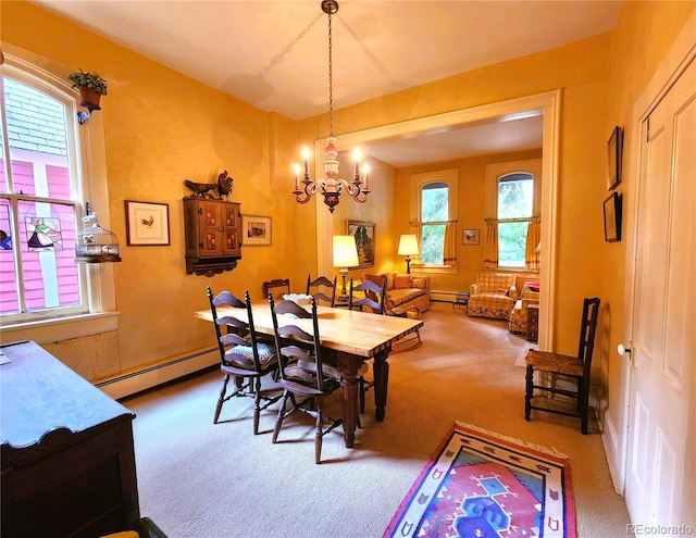 808 Rose St, Georgetown, CO 80444 - carpeted dining area with a baseboard radiator and a chandelier