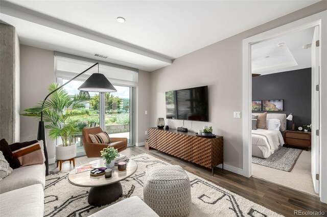 4200 W 17th Ave Unit 212, Denver, CO 80204 - living room with wood finished floors and baseboards