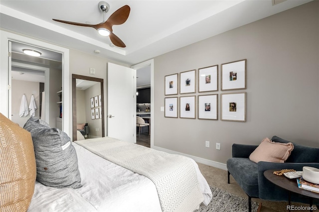 4200 W 17th Ave Unit 212, Denver, CO 80204 - carpeted bedroom featuring ceiling fan and baseboards