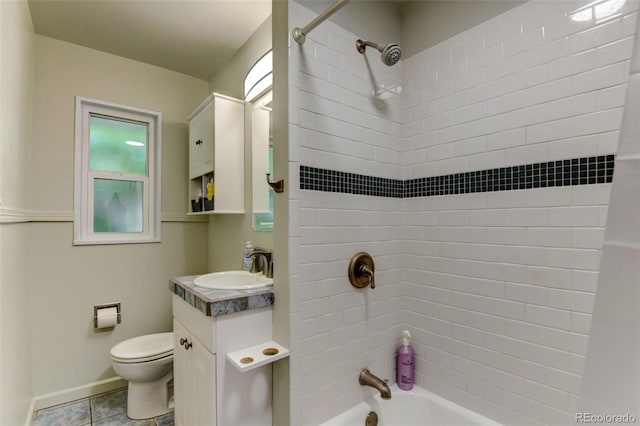 5690 E Cornell Ave, Denver, CO 80222 - bathroom with washtub / shower combination, vanity, and tile patterned flooring