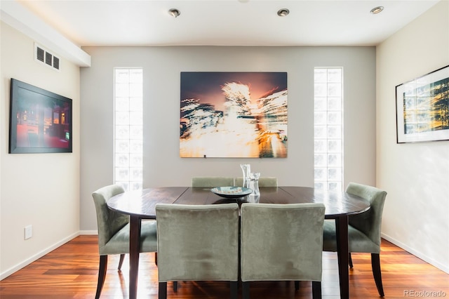 907 E 22nd Ave, Denver, CO 80205 - dining space featuring wood finished floors and recessed lighting