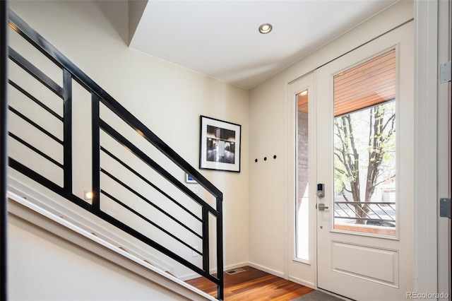 907 E 22nd Ave, Denver, CO 80205 - entryway with stairs, wood finished floors, and recessed lighting