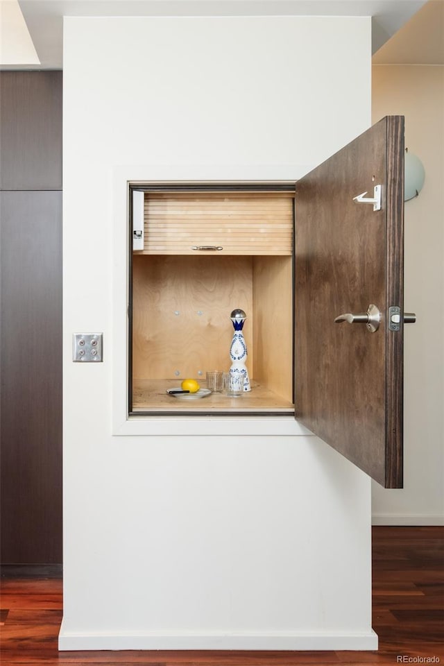907 E 22nd Ave, Denver, CO 80205 - detailed view of wood finished floors and baseboards