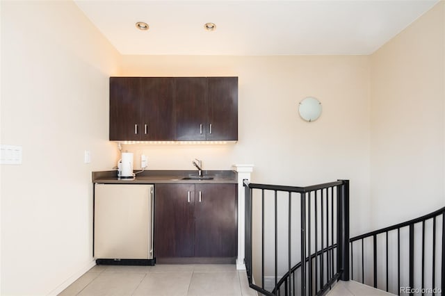 907 E 22nd Ave, Denver, CO 80205 - bar area featuring light tile patterned floors, fridge, and recessed lighting