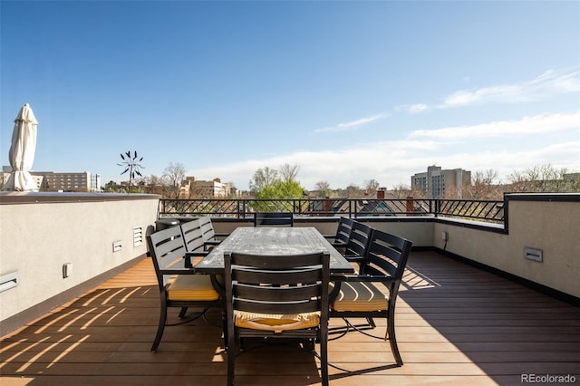 907 E 22nd Ave, Denver, CO 80205 - wooden terrace featuring outdoor dining area