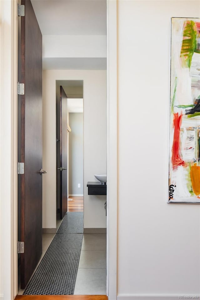 907 E 22nd Ave, Denver, CO 80205 - corridor with baseboards