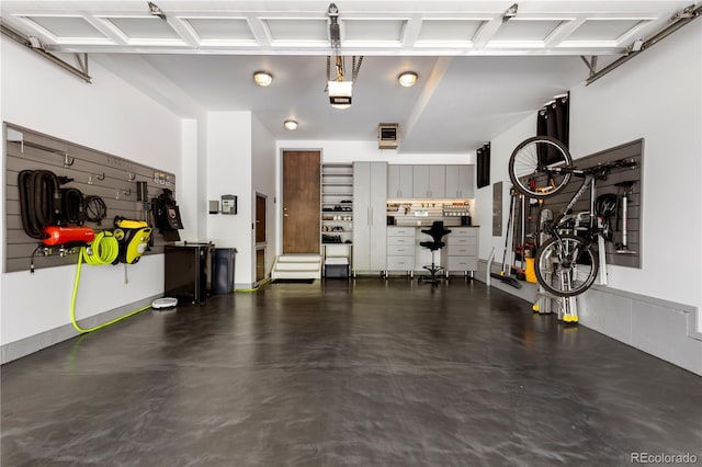 907 E 22nd Ave, Denver, CO 80205 - garage featuring a garage door opener