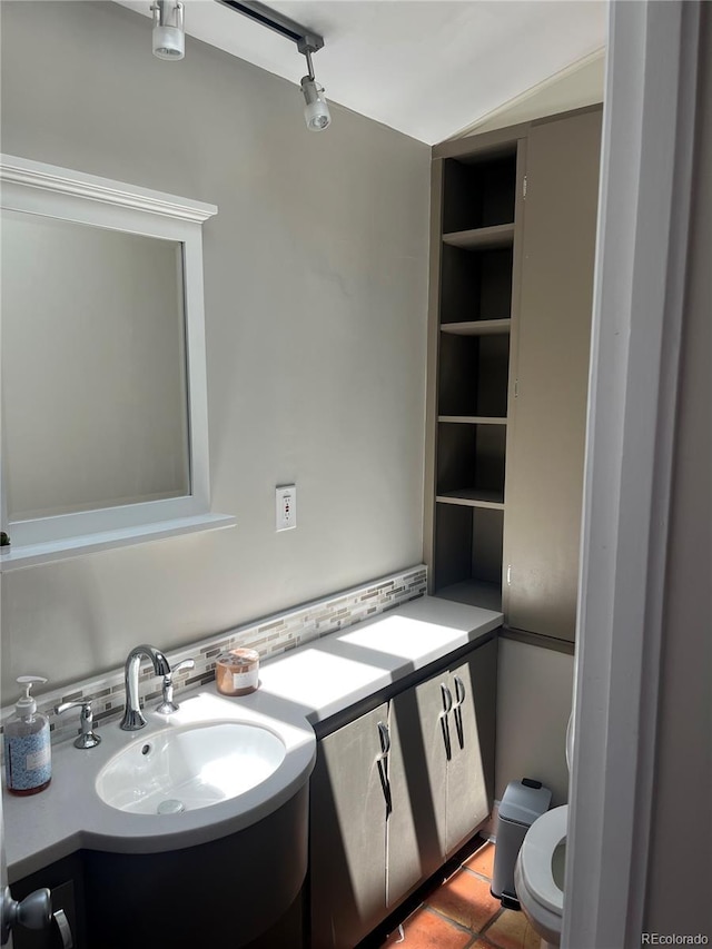 819 27th St, Denver, CO 80205 - half bathroom featuring toilet and vanity