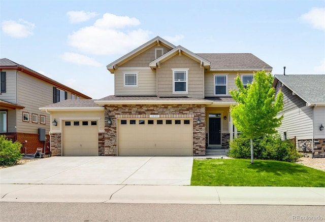 1339 Sidewinder Cir, Castle Rock, CO 80108 - craftsman inspired home with concrete driveway, a front lawn, an attached garage, and stone siding