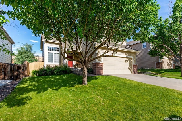 5972 S Zante Way, Aurora, CO 80015 - view of property hidden behind natural elements featuring an attached garage and concrete driveway