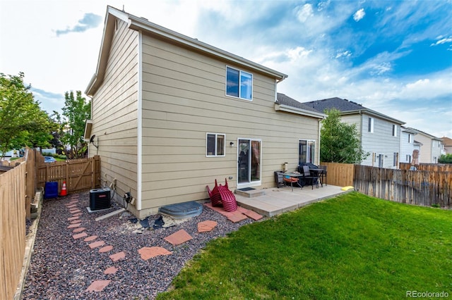 5972 S Zante Way, Aurora, CO 80015 - rear view of property with a patio and a fenced backyard