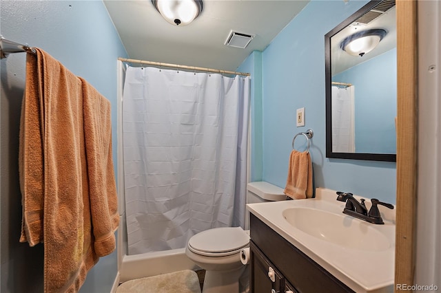 bathroom with toilet, visible vents, a shower with shower curtain, and vanity