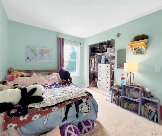 carpeted bedroom featuring a closet