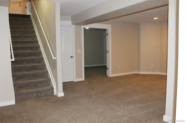 basement with carpet flooring