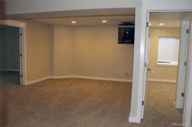 basement with carpet flooring