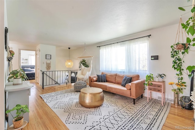 living room featuring light wood-type flooring