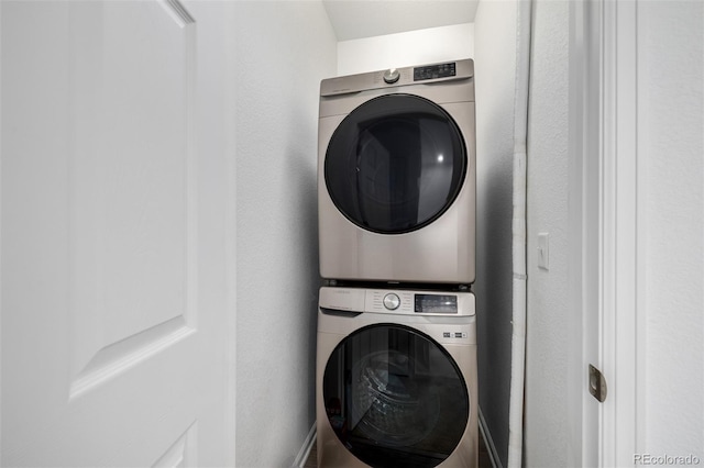 18199 E 96th Ave, Commerce City, CO 80022 - washroom featuring stacked washer / dryer