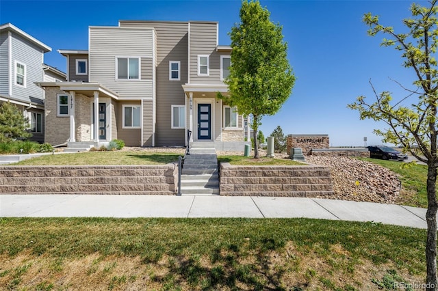 18199 E 96th Ave, Commerce City, CO 80022 - view of front of house featuring a front yard