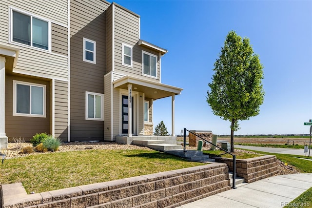 18199 E 96th Ave, Commerce City, CO 80022 - view of front of home with a front lawn