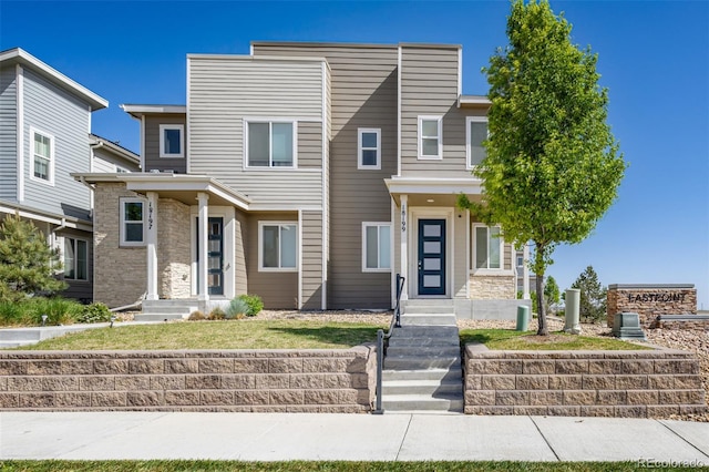 18199 E 96th Ave, Commerce City, CO 80022 - view of front facade featuring stone siding