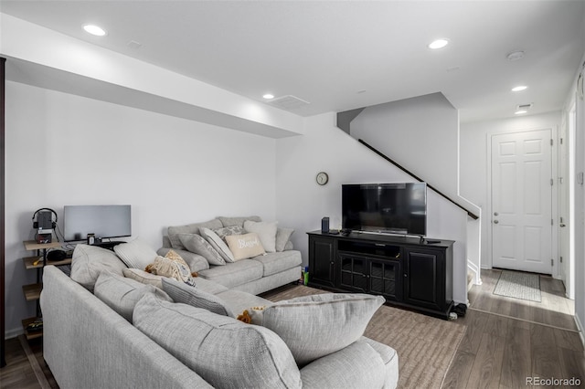 18199 E 96th Ave, Commerce City, CO 80022 - living area with recessed lighting, baseboards, wood finished floors, and stairway