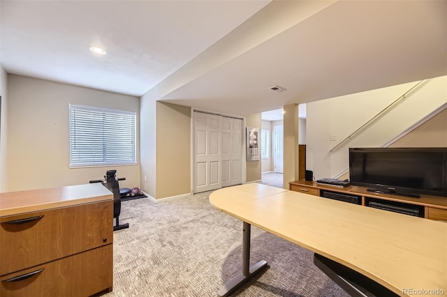 office featuring light colored carpet and baseboards