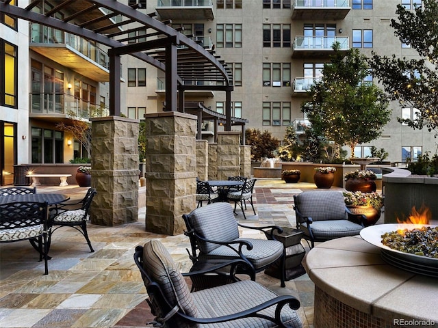 view of patio / terrace with a fire pit