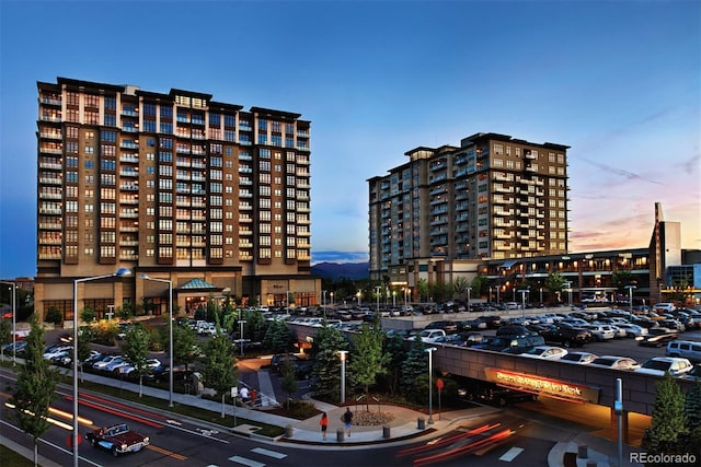 view of outdoor building at dusk