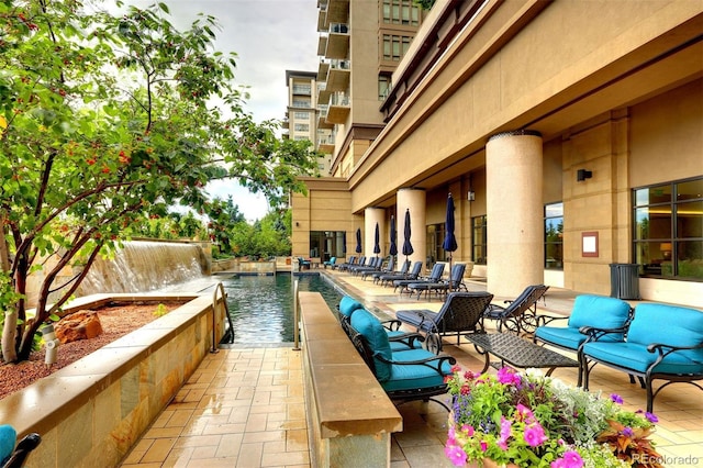 view of pool featuring a patio