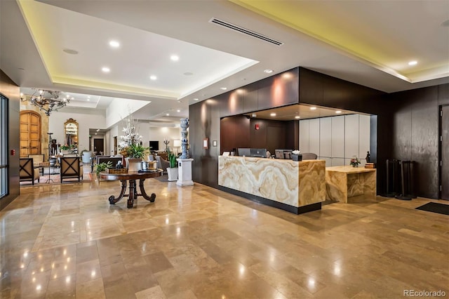 reception area with a chandelier