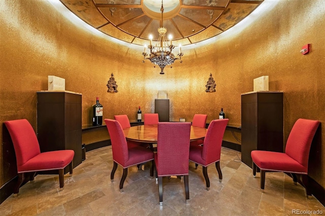 dining area with a notable chandelier