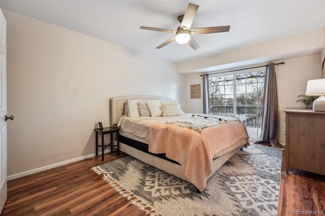 bedroom featuring wood finished floors, a ceiling fan, and baseboards