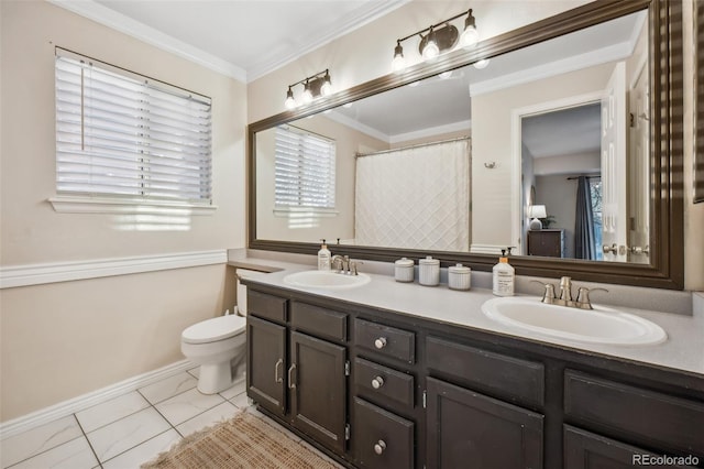 full bath with double vanity, ornamental molding, a sink, and toilet