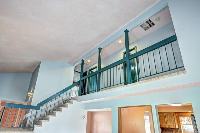 7300 Beech St, Arvada, CO 80005 - stairway with a towering ceiling