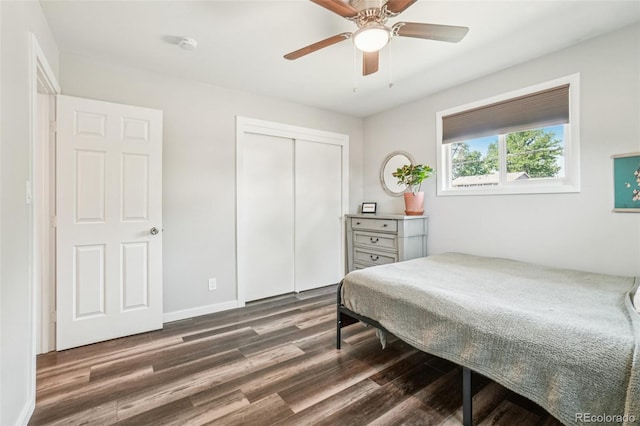 4715 Garland St, Wheat Ridge, CO 80033 - bedroom featuring dark wood finished floors, a closet, and ceiling fan