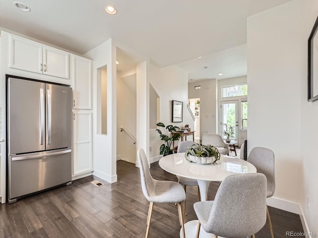 2507 Moline St, Aurora, CO 80010 - dining area featuring dark wood finished floors, baseboards, and recessed lighting