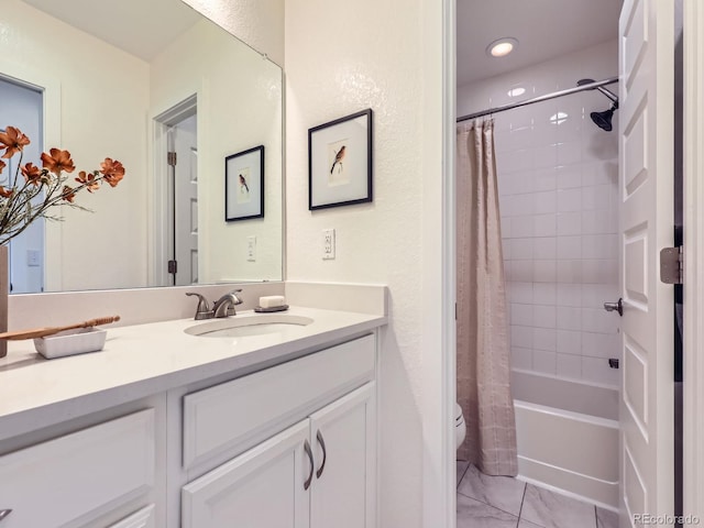 2507 Moline St, Aurora, CO 80010 - full bathroom featuring vanity, toilet, shower / bath combo with shower curtain, and recessed lighting