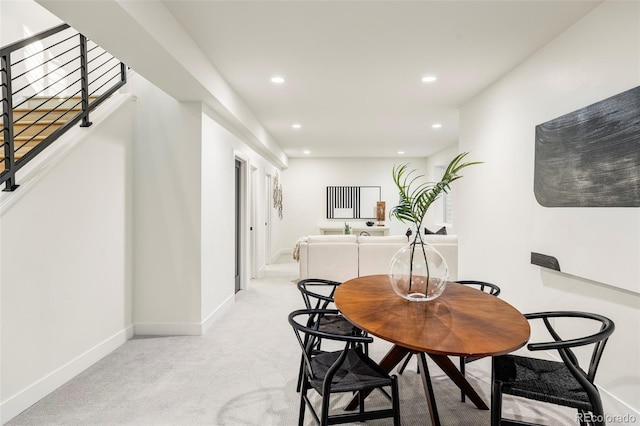 view of carpeted dining space