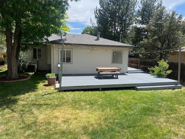 3209 E Yale Way, Denver, CO 80210 - rear view of property with a deck and roof with shingles
